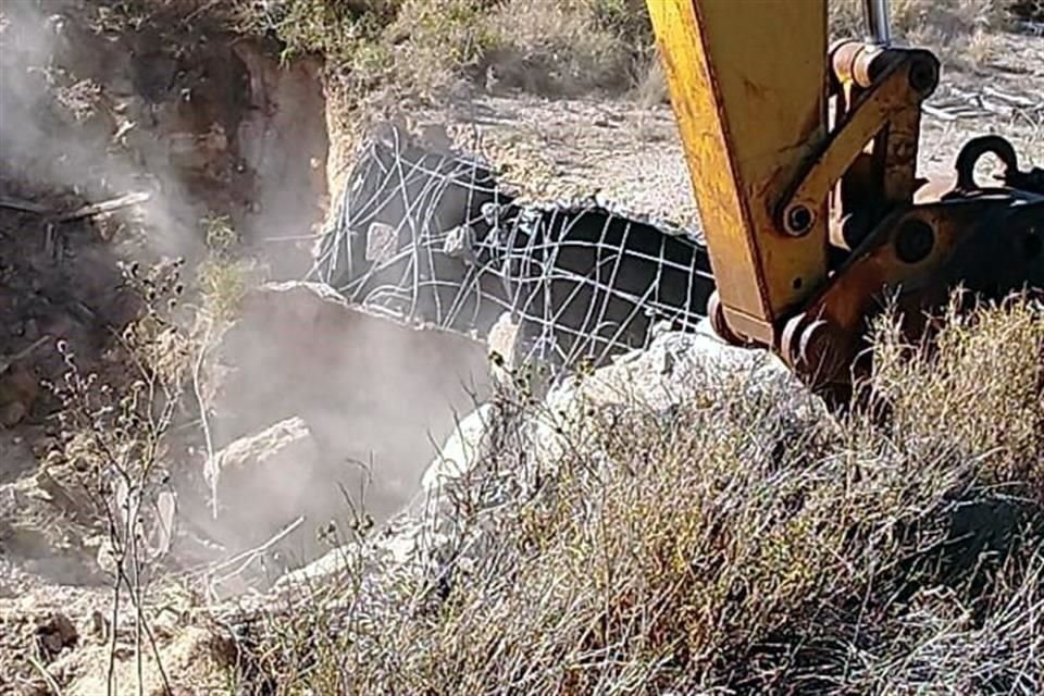 La construcción subterránera era utilizada para guardar armamento y vehículos.