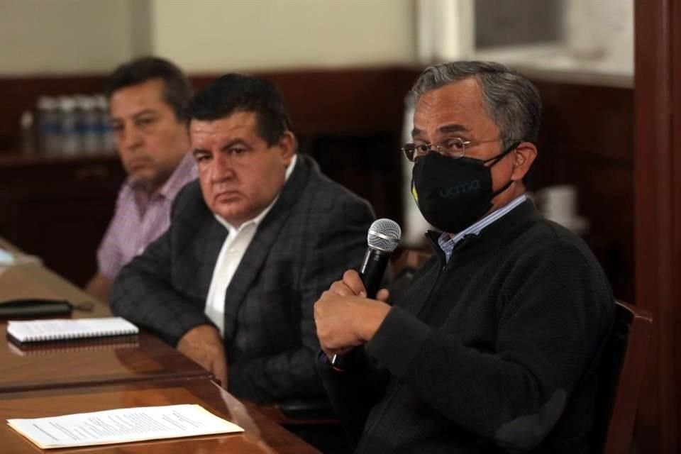 Francisco Javier Zaragoza (derecha), de UCMA, y Diego Bolio (centro), de la Conatram.