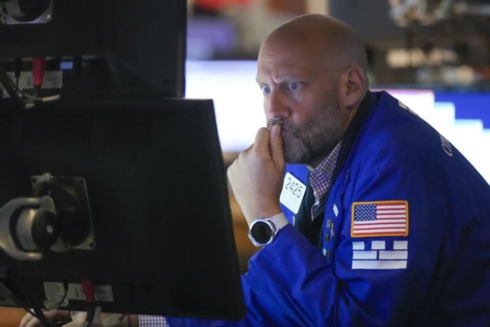 Traders work on the floor at the New York Stock Exchange in New York, Wednesday, July 26, 2023.