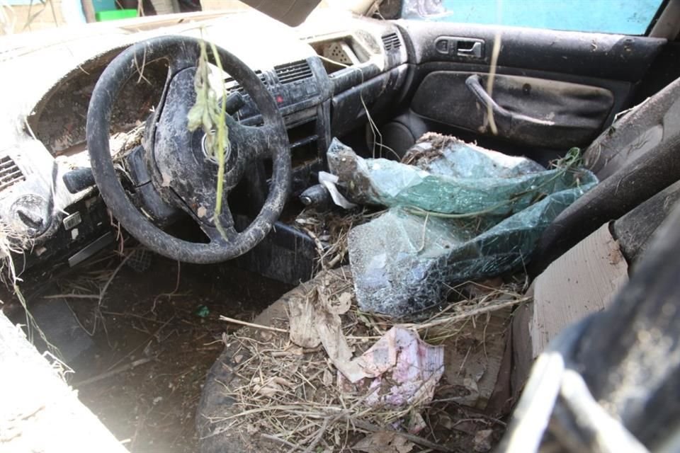Vehículos destruidos tras las fuertes lluvias en la ZMG.