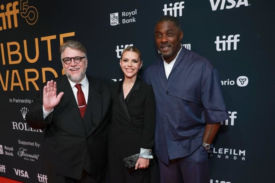 Del Toro posó con Kim Gordon e Idris Elba.