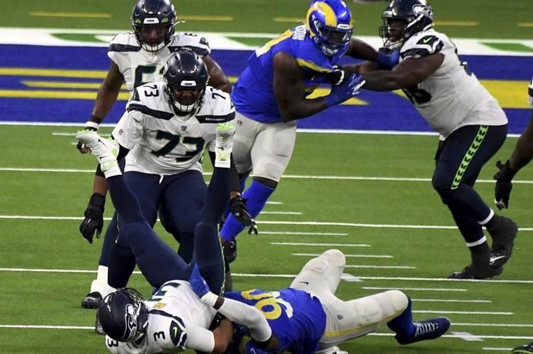 Jared Goff lanzó 302 yardas, Darious Williams hizo dos intercepciones y Carneros tomaron ventaja de la División Oeste de la Nacional con una victoria 23-16 sobre los Halcones Marinos.